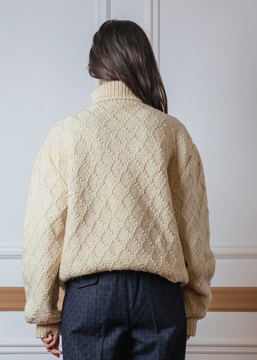 Pull col roulé